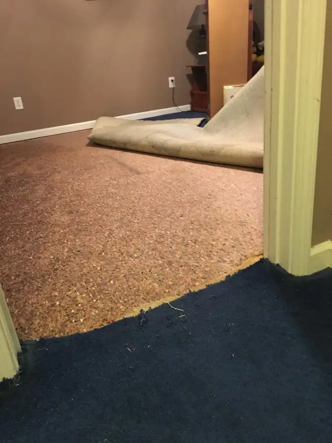 Carpet pad removal revealing water damage during Drying & Dehumidification in Makawao